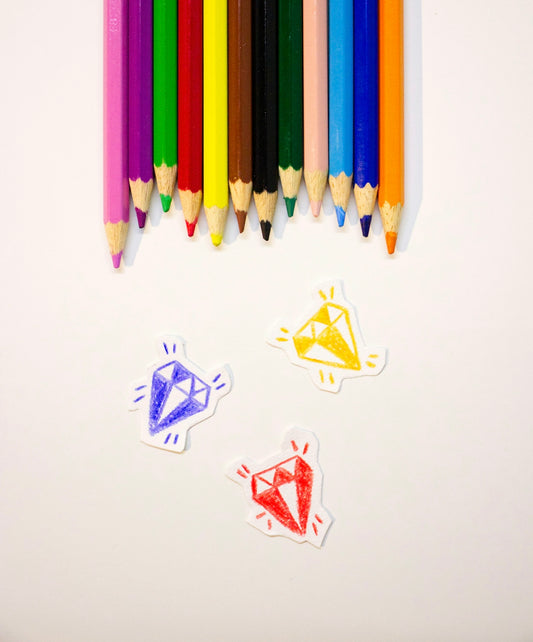 purple blue and yellow color pencils