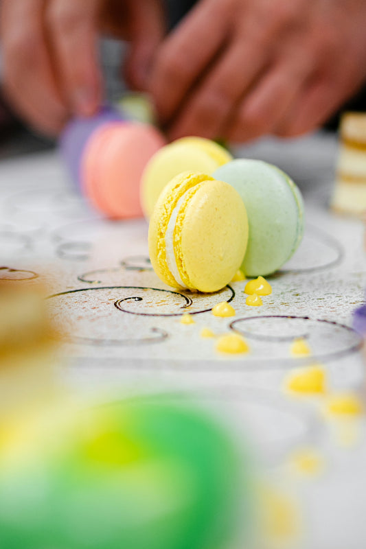 a close up of a person decorating a table