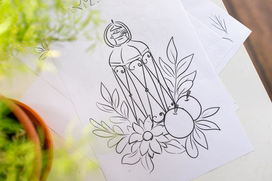 a bunch of paper with some drawings on it