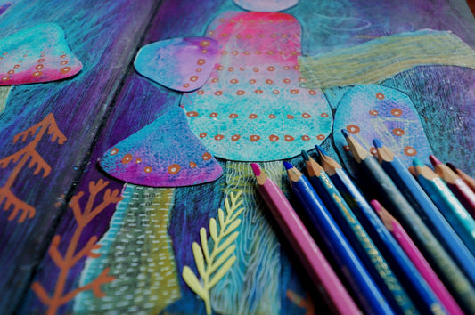 Colorful abstract art with colored pencils on a table