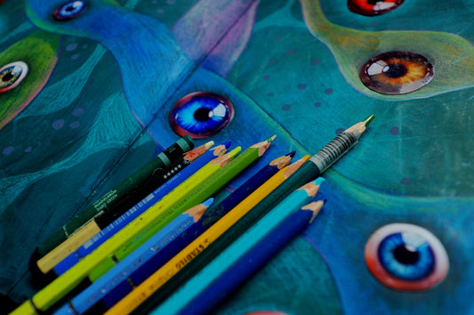 Colored pencils and pen on abstract eye artwork